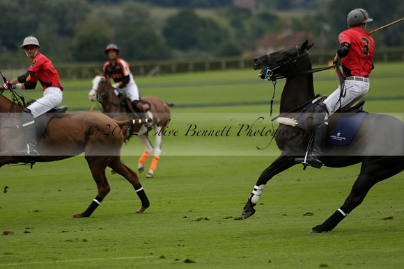 Four Quarters Black (black) v Clashleigh (red) in the Autumn Cup subsidiary final polo match on Ambersham 2 at Cowdray Park Polo Club on Sunday 22 September 2013 www.polopictures.co.uk