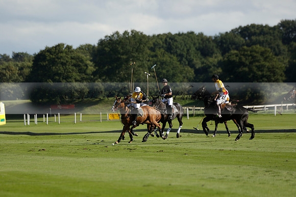 Aryana (black) v Shoreline (yellow) in a Farewell Cup polo match played on Ambersham 5 at Cowdray Park Polo Club on Wednesday 18 September 2013. www.polopictures.co.uk