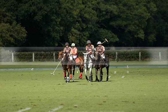 Four Quarters Black (black) v BHC (red) in a Autumn Cup polo match on Ambersham 2 at Cowdray Park Polo Club on Friday 20 September 2013 www.polopictures.co.uk