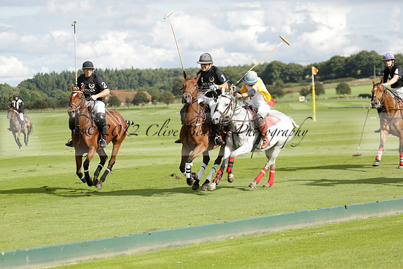 Aryana (black) v Shoreline (yellow) in a Farewell Cup polo match played on Ambersham 5 at Cowdray Park Polo Club on Wednesday 18 September 2013. www.polopictures.co.uk
