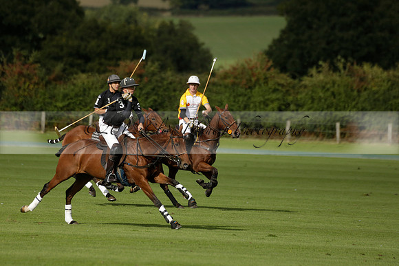 Aryana (black) v Shoreline (yellow) in a Farewell Cup polo match played on Ambersham 5 at Cowdray Park Polo Club on Wednesday 18 September 2013. www.polopictures.co.uk