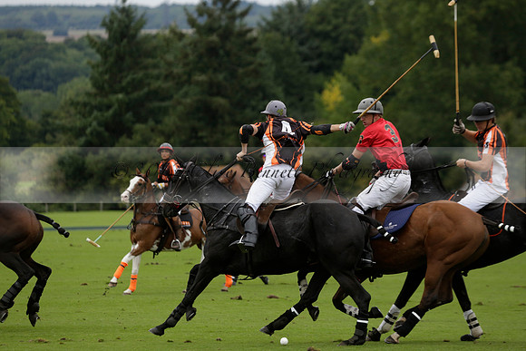 Four Quarters Black (black) v Clashleigh (red) in the Autumn Cup subsidiary final polo match on Ambersham 2 at Cowdray Park Polo Club on Sunday 22 September 2013 www.polopictures.co.uk