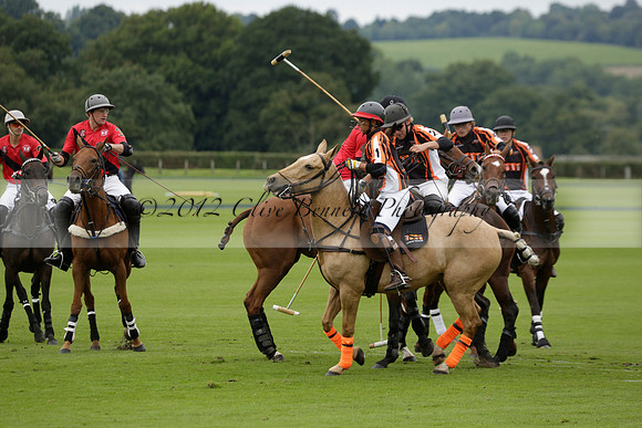 Four Quarters Black (black) v Clashleigh (red) in the Autumn Cup subsidiary final polo match on Ambersham 2 at Cowdray Park Polo Club on Sunday 22 September 2013 www.polopictures.co.uk