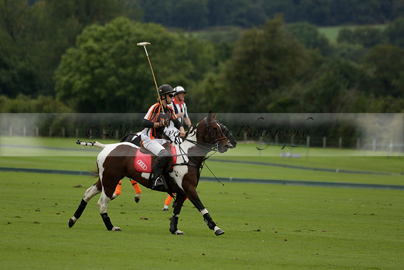 Four Quarters Black (black) v Clashleigh (red) in the Autumn Cup subsidiary final polo match on Ambersham 2 at Cowdray Park Polo Club on Sunday 22 September 2013 www.polopictures.co.uk