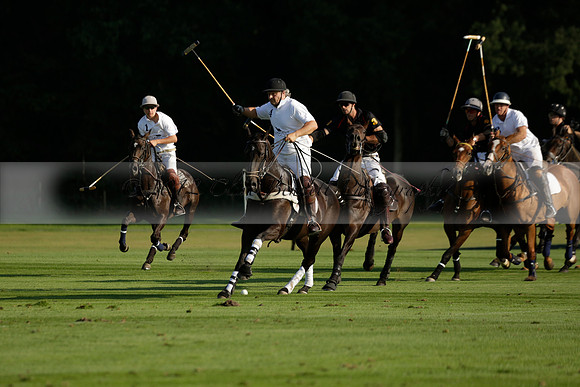 Pluma Negra (white) v Shoreline (black) in the Brecknock Cup Subsidiary final polo match played on Sunday 25 August 2013 at Cowdray Park Polo Club on Ambersham 1. 2013.10.12 www.polopictures.co.uk