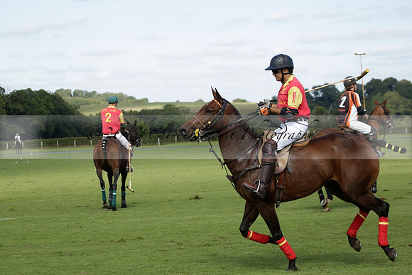 Four Quarters Black (black) v BHC (red) in a Autumn Cup polo match on Ambersham 2 at Cowdray Park Polo Club on Friday 20 September 2013 www.polopictures.co.uk