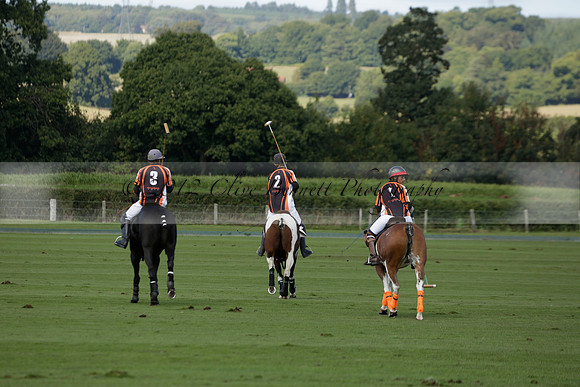Four Quarters Black (black) v BHC (red) in a Autumn Cup polo match on Ambersham 2 at Cowdray Park Polo Club on Friday 20 September 2013 www.polopictures.co.uk