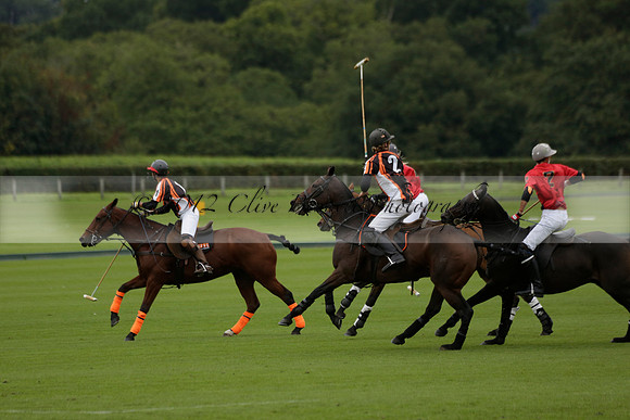 Four Quarters Black (black) v Clashleigh (red) in the Autumn Cup subsidiary final polo match on Ambersham 2 at Cowdray Park Polo Club on Sunday 22 September 2013 www.polopictures.co.uk