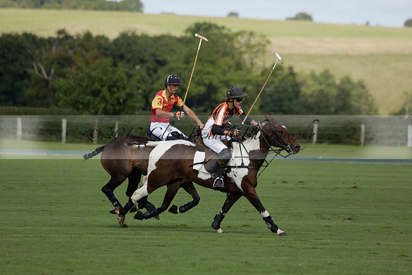 Four Quarters Black (black) v BHC (red) in a Autumn Cup polo match on Ambersham 2 at Cowdray Park Polo Club on Friday 20 September 2013 www.polopictures.co.uk