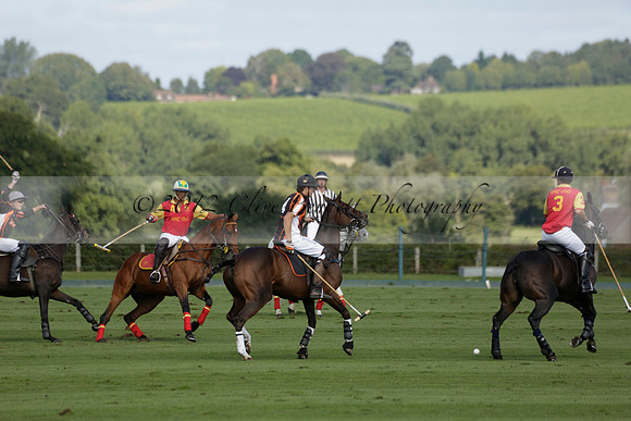 Four Quarters Black (black) v BHC (red) in a Autumn Cup polo match on Ambersham 2 at Cowdray Park Polo Club on Friday 20 September 2013 www.polopictures.co.uk