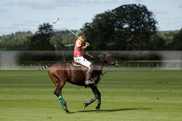 Four Quarters Black (black) v BHC (red) in a Autumn Cup polo match on Ambersham 2 at Cowdray Park Polo Club on Friday 20 September 2013 www.polopictures.co.uk