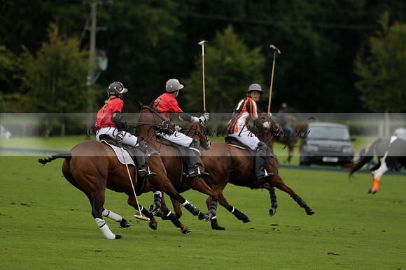 Four Quarters Black (black) v Clashleigh (red) in the Autumn Cup subsidiary final polo match on Ambersham 2 at Cowdray Park Polo Club on Sunday 22 September 2013 www.polopictures.co.uk