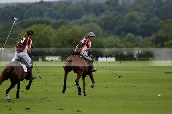 Four Quarters Black (black) v Clashleigh (red) in the Autumn Cup subsidiary final polo match on Ambersham 2 at Cowdray Park Polo Club on Sunday 22 September 2013 www.polopictures.co.uk