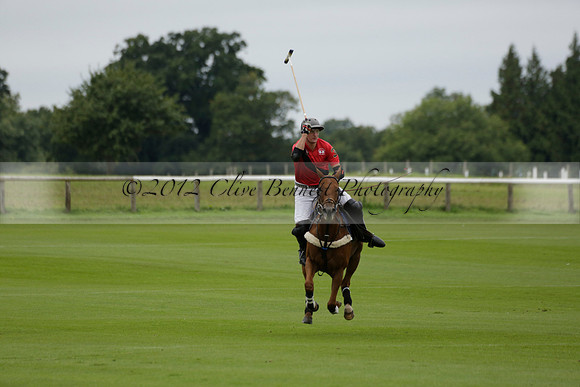 Four Quarters Black (black) v Clashleigh (red) in the Autumn Cup subsidiary final polo match on Ambersham 2 at Cowdray Park Polo Club on Sunday 22 September 2013 www.polopictures.co.uk