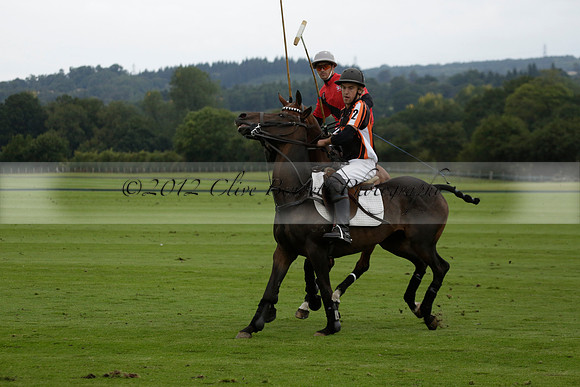 Four Quarters Black (black) v Clashleigh (red)in a Jaeger Le Coultre Autumn Cup polo match played on Ambersham 2 at Cowdray Park Polo Club on Wednesday 2013.09.11 www.polopictures.co.uk