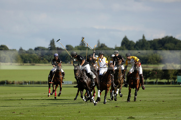 Aryana (black) v Shoreline (yellow) in a Farewell Cup polo match played on Ambersham 5 at Cowdray Park Polo Club on Wednesday 18 September 2013. www.polopictures.co.uk