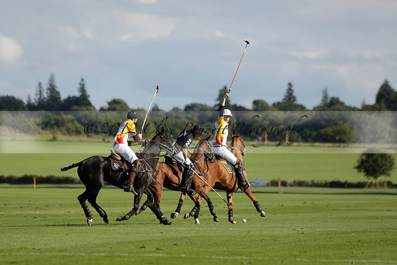 Aryana (black) v Shoreline (yellow) in a Farewell Cup polo match played on Ambersham 5 at Cowdray Park Polo Club on Wednesday 18 September 2013. www.polopictures.co.uk