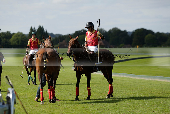 Four Quarters Black (black) v BHC (red) in a Autumn Cup polo match on Ambersham 2 at Cowdray Park Polo Club on Friday 20 September 2013 www.polopictures.co.uk