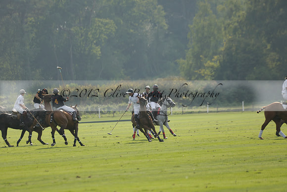 Pluma Negra (white) v Shoreline (black) in the Brecknock Cup Subsidiary final polo match played on Sunday 25 August 2013 at Cowdray Park Polo Club on Ambersham 1. 2013.10.12 www.polopictures.co.uk