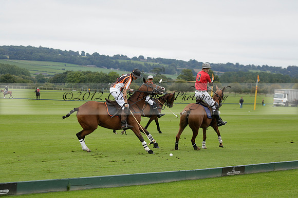 Four Quarters Black (black) v Clashleigh (red) in the Autumn Cup subsidiary final polo match on Ambersham 2 at Cowdray Park Polo Club on Sunday 22 September 2013 www.polopictures.co.uk