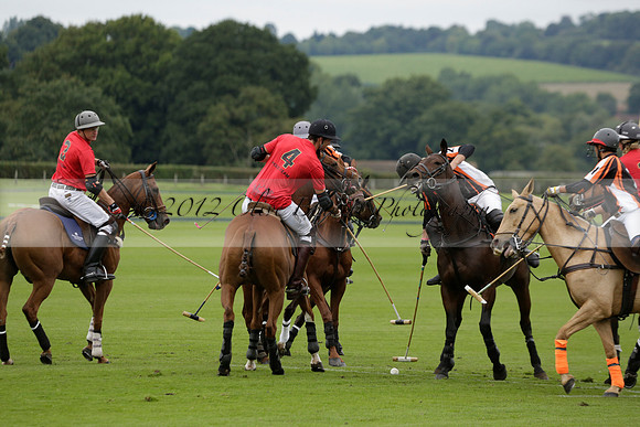 Four Quarters Black (black) v Clashleigh (red) in the Autumn Cup subsidiary final polo match on Ambersham 2 at Cowdray Park Polo Club on Sunday 22 September 2013 www.polopictures.co.uk