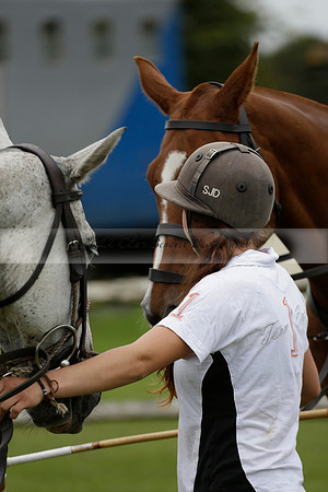 Four Quarters Black (black) v Clashleigh (red) in the Autumn Cup subsidiary final polo match on Ambersham 2 at Cowdray Park Polo Club on Sunday 22 September 2013 www.polopictures.co.uk