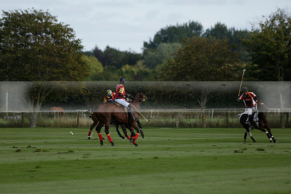 Four Quarters Black (black) v BHC (red) in a Autumn Cup polo match on Ambersham 2 at Cowdray Park Polo Club on Friday 20 September 2013 www.polopictures.co.uk