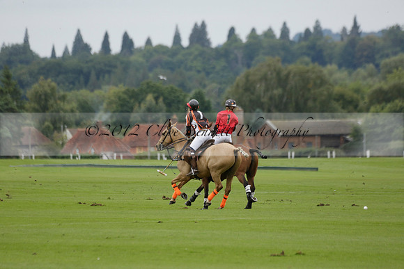 Four Quarters Black (black) v Clashleigh (red) in the Autumn Cup subsidiary final polo match on Ambersham 2 at Cowdray Park Polo Club on Sunday 22 September 2013 www.polopictures.co.uk