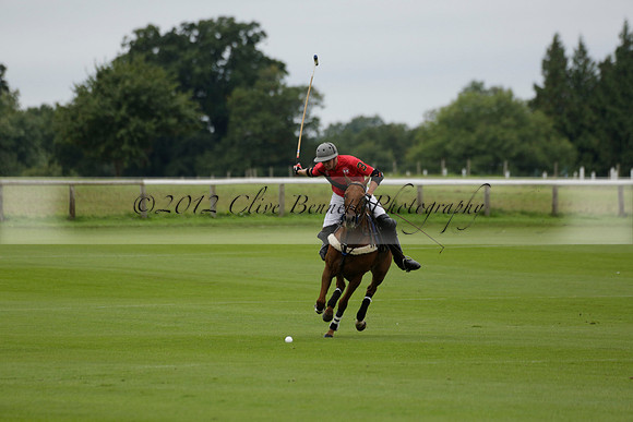 Four Quarters Black (black) v Clashleigh (red) in the Autumn Cup subsidiary final polo match on Ambersham 2 at Cowdray Park Polo Club on Sunday 22 September 2013 www.polopictures.co.uk