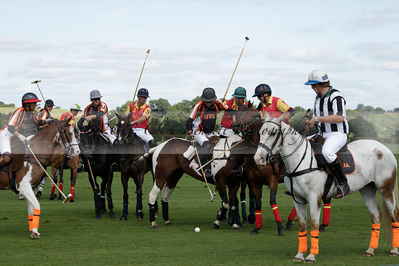 Four Quarters Black (black) v BHC (red) in a Autumn Cup polo match on Ambersham 2 at Cowdray Park Polo Club on Friday 20 September 2013 www.polopictures.co.uk