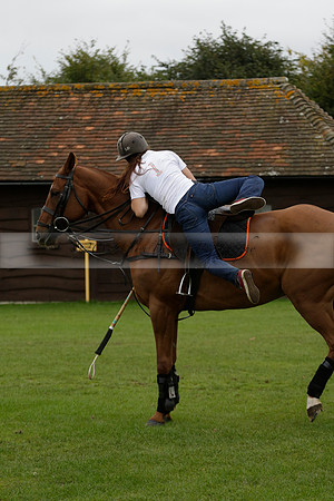 Four Quarters Black (black) v Clashleigh (red) in the Autumn Cup subsidiary final polo match on Ambersham 2 at Cowdray Park Polo Club on Sunday 22 September 2013 www.polopictures.co.uk