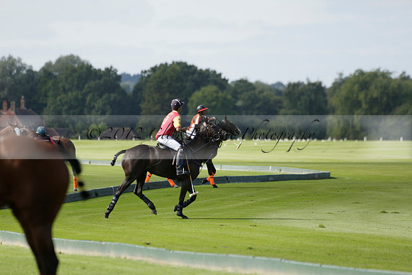 Four Quarters Black (black) v BHC (red) in a Autumn Cup polo match on Ambersham 2 at Cowdray Park Polo Club on Friday 20 September 2013 www.polopictures.co.uk