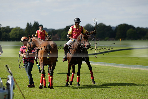 Four Quarters Black (black) v BHC (red) in a Autumn Cup polo match on Ambersham 2 at Cowdray Park Polo Club on Friday 20 September 2013 www.polopictures.co.uk