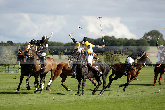 Aryana (black) v Shoreline (yellow) in a Farewell Cup polo match played on Ambersham 5 at Cowdray Park Polo Club on Wednesday 18 September 2013. www.polopictures.co.uk