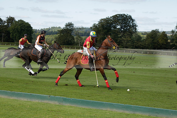 Four Quarters Black (black) v BHC (red) in a Autumn Cup polo match on Ambersham 2 at Cowdray Park Polo Club on Friday 20 September 2013 www.polopictures.co.uk