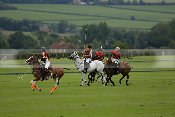Four Quarters Black (black) v Clashleigh (red) in the Autumn Cup subsidiary final polo match on Ambersham 2 at Cowdray Park Polo Club on Sunday 22 September 2013 www.polopictures.co.uk