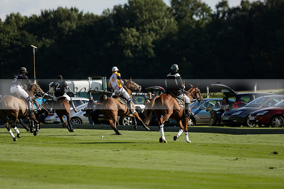 Aryana (black) v Shoreline (yellow) in a Farewell Cup polo match played on Ambersham 5 at Cowdray Park Polo Club on Wednesday 18 September 2013. www.polopictures.co.uk