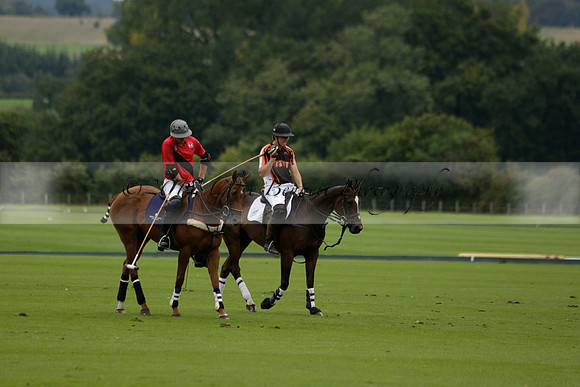 Four Quarters Black (black) v Clashleigh (red) in the Autumn Cup subsidiary final polo match on Ambersham 2 at Cowdray Park Polo Club on Sunday 22 September 2013 www.polopictures.co.uk
