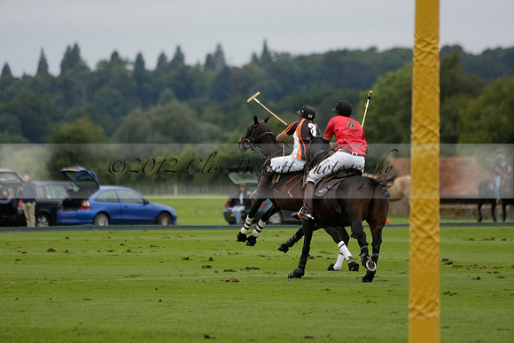 Four Quarters Black (black) v Clashleigh (red) in the Autumn Cup subsidiary final polo match on Ambersham 2 at Cowdray Park Polo Club on Sunday 22 September 2013 www.polopictures.co.uk