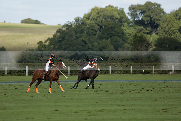 Four Quarters Black (black) v BHC (red) in a Autumn Cup polo match on Ambersham 2 at Cowdray Park Polo Club on Friday 20 September 2013 www.polopictures.co.uk