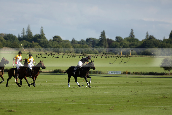 Aryana (black) v Shoreline (yellow) in a Farewell Cup polo match played on Ambersham 5 at Cowdray Park Polo Club on Wednesday 18 September 2013. www.polopictures.co.uk