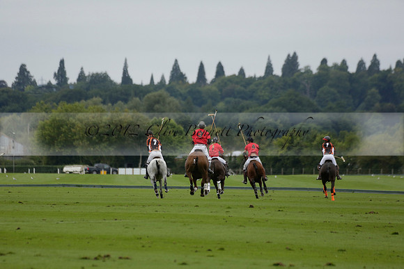 Four Quarters Black (black) v Clashleigh (red) in the Autumn Cup subsidiary final polo match on Ambersham 2 at Cowdray Park Polo Club on Sunday 22 September 2013 www.polopictures.co.uk