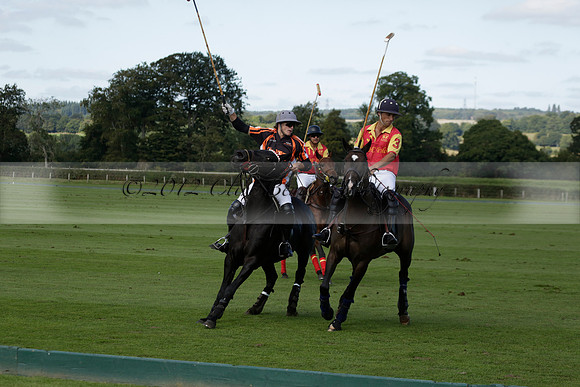 Four Quarters Black (black) v BHC (red) in a Autumn Cup polo match on Ambersham 2 at Cowdray Park Polo Club on Friday 20 September 2013 www.polopictures.co.uk