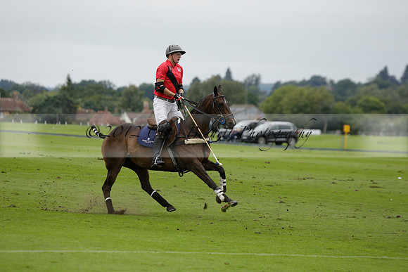Four Quarters Black (black) v Clashleigh (red) in the Autumn Cup subsidiary final polo match on Ambersham 2 at Cowdray Park Polo Club on Sunday 22 September 2013 www.polopictures.co.uk
