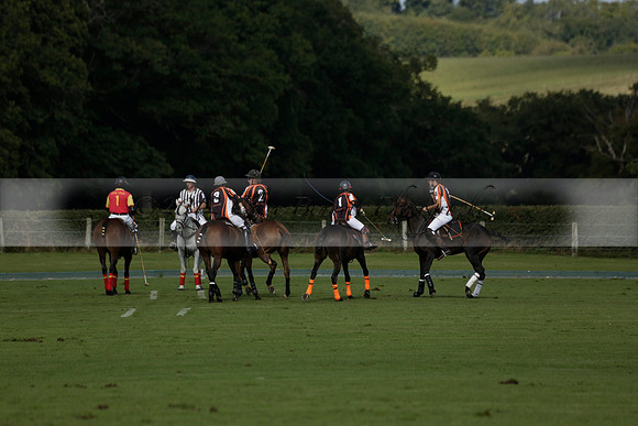 Four Quarters Black (black) v BHC (red) in a Autumn Cup polo match on Ambersham 2 at Cowdray Park Polo Club on Friday 20 September 2013 www.polopictures.co.uk