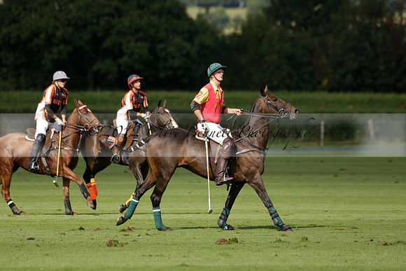 Four Quarters Black (black) v BHC (red) in a Autumn Cup polo match on Ambersham 2 at Cowdray Park Polo Club on Friday 20 September 2013 www.polopictures.co.uk