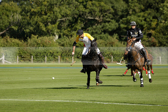 Aryana (black) v Shoreline (yellow) in a Farewell Cup polo match played on Ambersham 5 at Cowdray Park Polo Club on Wednesday 18 September 2013. www.polopictures.co.uk