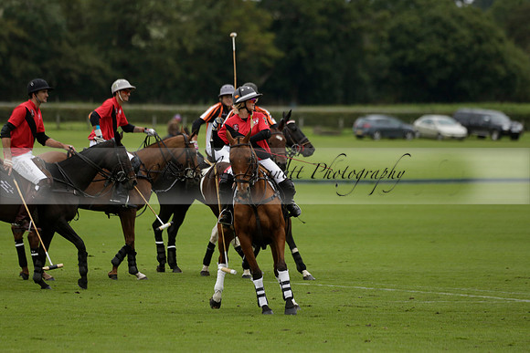 Four Quarters Black (black) v Clashleigh (red) in the Autumn Cup subsidiary final polo match on Ambersham 2 at Cowdray Park Polo Club on Sunday 22 September 2013 www.polopictures.co.uk