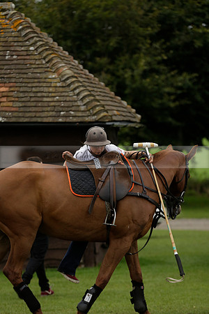 Four Quarters Black (black) v Clashleigh (red) in the Autumn Cup subsidiary final polo match on Ambersham 2 at Cowdray Park Polo Club on Sunday 22 September 2013 www.polopictures.co.uk