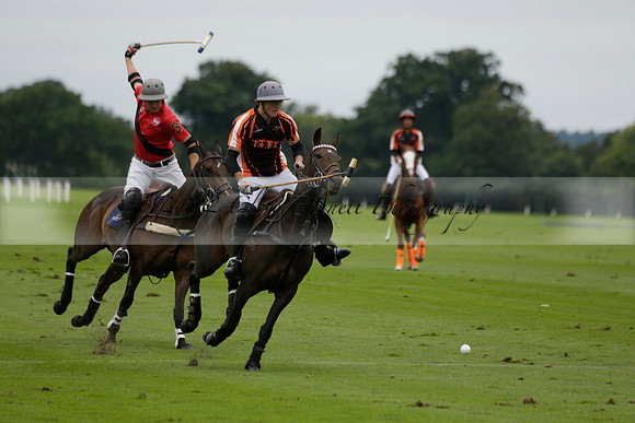 Four Quarters Black (black) v Clashleigh (red) in the Autumn Cup subsidiary final polo match on Ambersham 2 at Cowdray Park Polo Club on Sunday 22 September 2013 www.polopictures.co.uk